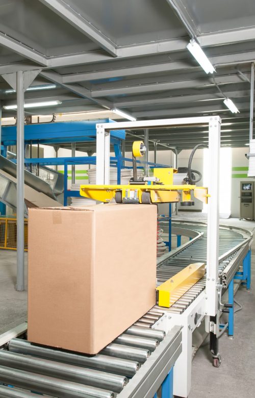plant for the production of household air conditioners packed electrical engineering cardboard boxes on a conveyor belt in factory